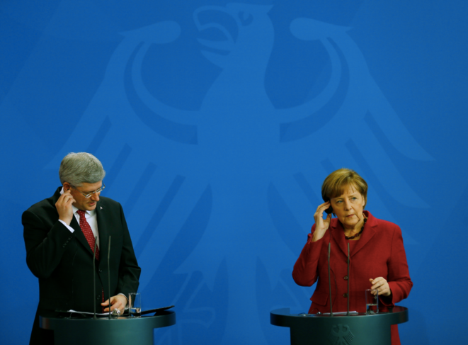Le Canadien Stephen Harper, avec Angela Merkel. Berlin est sur la défensive sur la clause ISDS. © Reuters. Mars 2014, Berlin. Le Canadien Stephen Harper, avec Angela Merkel. Berlin est sur la défensive sur la clause ISDS. © Reuters. Mars 2014, Berlin.